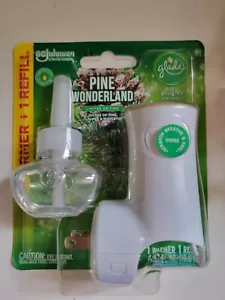 Glade Plugins Starter Kit Olio Profumato 1 Scaldabagno + 1 Ricarica Pino Wonderland - Foto 1 di 2