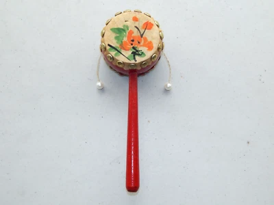 Wooden Spinning Pellet Rattle Stick Drum Toy Floral Design Made in China 7" (L) - Image 1 of 4