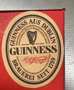 GUINNESS AUS DUBLIN 6,25 X 5 ZOLL OVALER GESTANZTER BIERUNTERSETZER - Bild 1 von 2