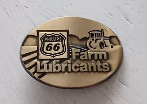 Lubricantes agrícolas Phillips 66 de colección latón macizo ovalado hebilla de cinturón tractor petróleo gas - Imagen 1 de 3