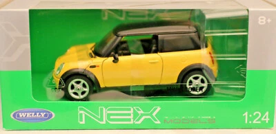 ++Mini Cooper gelb/schwarz++WELLY++Maßstab 1/24++gelb++neu und unbespielt - Bild 1 von 4