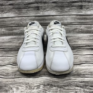 all white cortez shoes