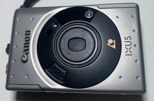 Original Canon Ixus Filmkamera mit Zoomobjektiv 24-48mm 1:4.5-6.2 Pop Flash - Bild 1 von 6