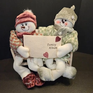 Snowman and Snowlady sitting on bench Going through Family Album (#427) - Picture 1 of 9