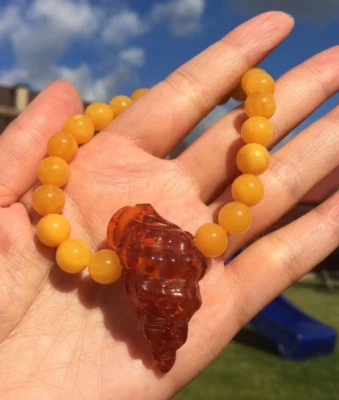 Luxury Designer Baltic Amber Yellow Cognac Sea Shell Sea snail beads bracelet - Image 1 of 4