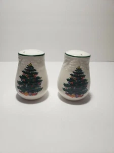 White ceramic salt and pepper Shakers with Christmas trees painted on them.  - Picture 1 of 5