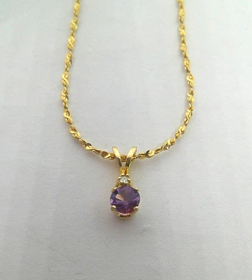 Delicado collar retorcido de oro amarillo de 14K y colgante de amatista - 18" L - 2,73 gramos Foto 1 de 4