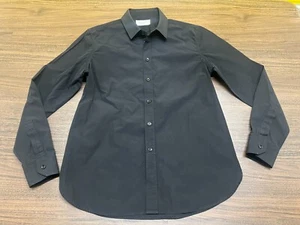 Saint Laurent schwarzes Langarm-Uniformhemd aus Baumwolle mit Knopfleiste YSL - Gr. F42 - Bild 1 von 6