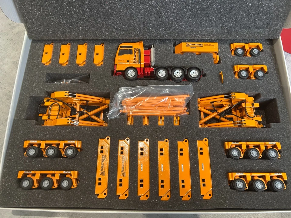 Conrad 1:50 MAN TGA SLT 8x4 + Goldhoffer 16 assi trave rimorchio Schaumann - Immagine 1 di 1