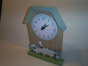 Beautiful 10.5" x 7.5" Quartz Wall Clock Showing 3 White Ducks By A Blue Fence - Picture 1 of 3