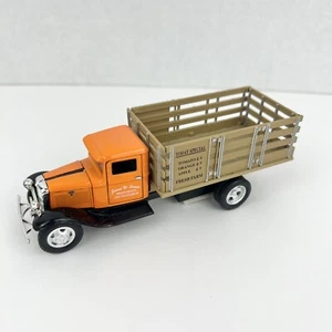 Vintage 1934 Orange Ford Diecast 1:43 Pull Back Stake Bed Fruit Truck - Picture 1 of 8