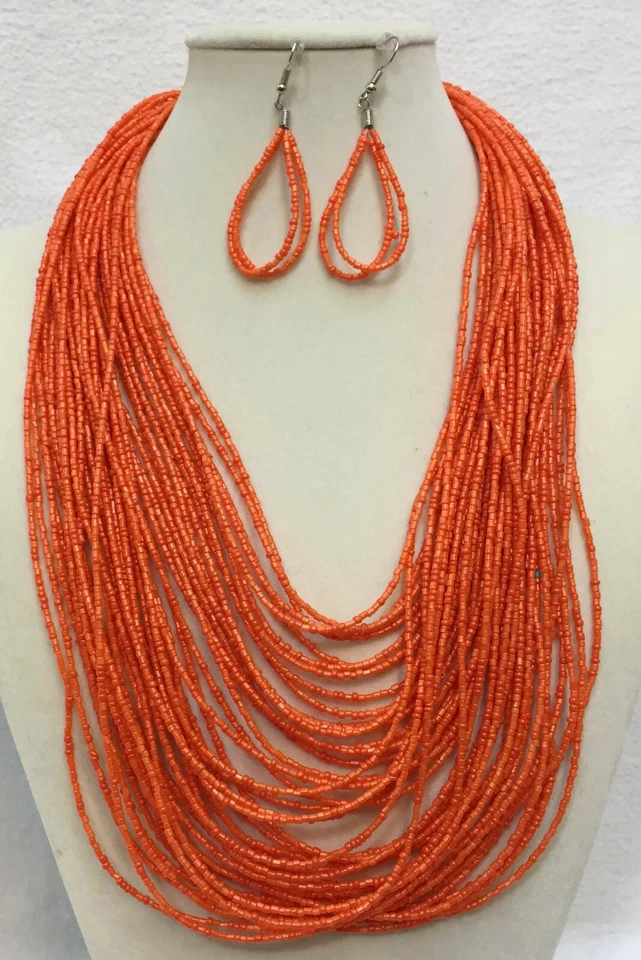Collar Multi Hilo Babero y Pendientes Naranja Semilla Cuentas Set 42 Cuerdas Gotas Lágrimas Foto 1 de 3