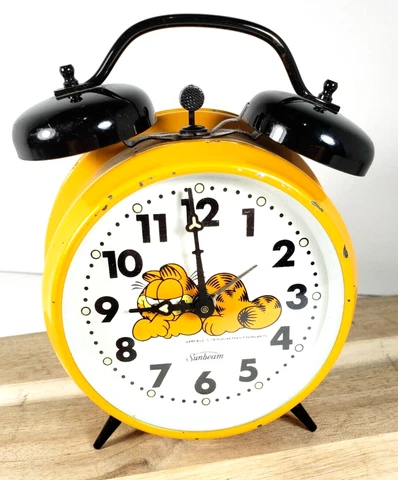 Vintage SUNBEAM GARFIELD ALARM CLOCK Twin Bell 1978 Yellow Metal Needs Repair Cover