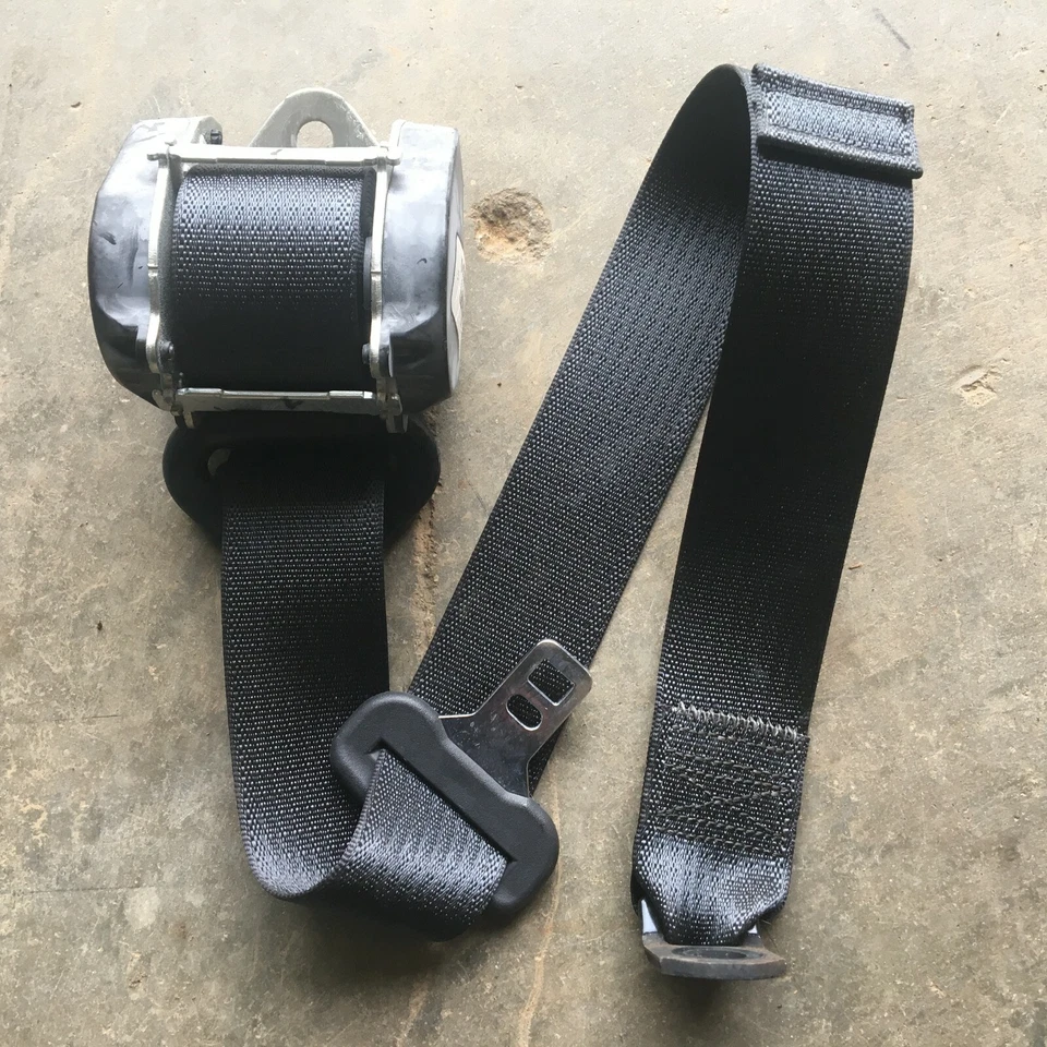 07 08 2008 Dodge Caliber cinturón de seguridad trasero izquierdo conductor retractor gris Foto 1 de 1