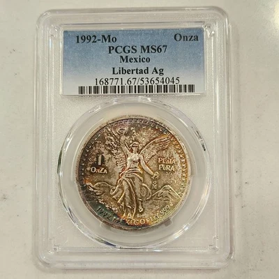 1992-Mo 1 Onza Mexico Silver Libertad ~ PCGS MS 67 ~ Rainbow Toned Colors - Image 1 of 4