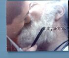 FOUND COLOR PHOTO C+8050 CLOSEUP OF WOMAN KISSING BEARDED MAN