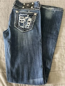 Pantalones de mezclilla Miss Me talla 28 bota desgastados costuras gruesas sexys usados en excelente estado 34” de largo - Imagen 1 de 8