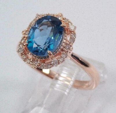 3Ct Oval Lab Created Blue Topaz Halo Engagement Ring with 14K Rose Gold Finish - Imagem 1 de 4