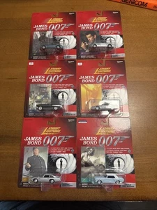 Johnny Lightning James Bond 007 1999 Lot Of 6 NEW Aston Martin BMW Z3 Z8 Mustang - Picture 1 of 8