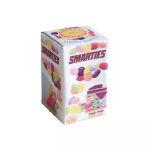 Huevo de Pascua blanco Smarties para casa de muñecas escala 12 - Imagen 1 de 1