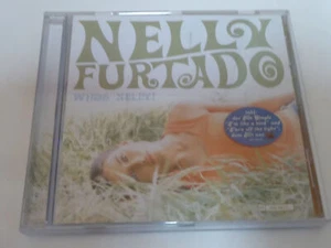 NELLY FURTADO : Whoa Nelly! > VG+ (CD) - Bild 1 von 4