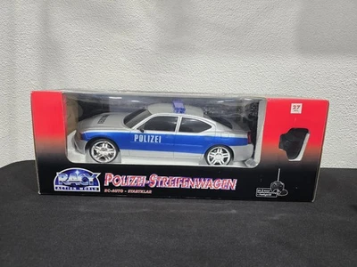 NEW RARE REMOTE CONTROL 1/14 SCALE DODGE CHARGER RC POLICE POLIZEI STREIFENWAGEN - Image 1 of 4