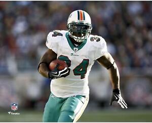 Ricky Williams Miami Dolphins Unsigned White Jersey Running 8" x 10" Photo