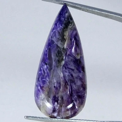 19,00 cts. AA+ Piedra preciosa cabujón pera charoita púrpura natural 14X32X5MM Foto 1 de 4