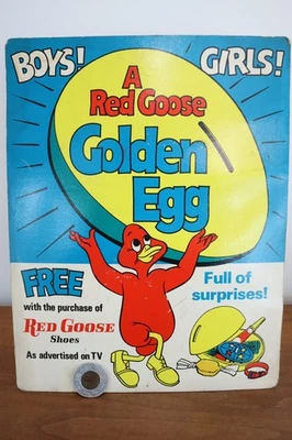 Letrero y moneda de exhibición de zapatos de ganso rojo vintage de los años 60 - juguete de huevo dorado publicidad Foto 1 de 4