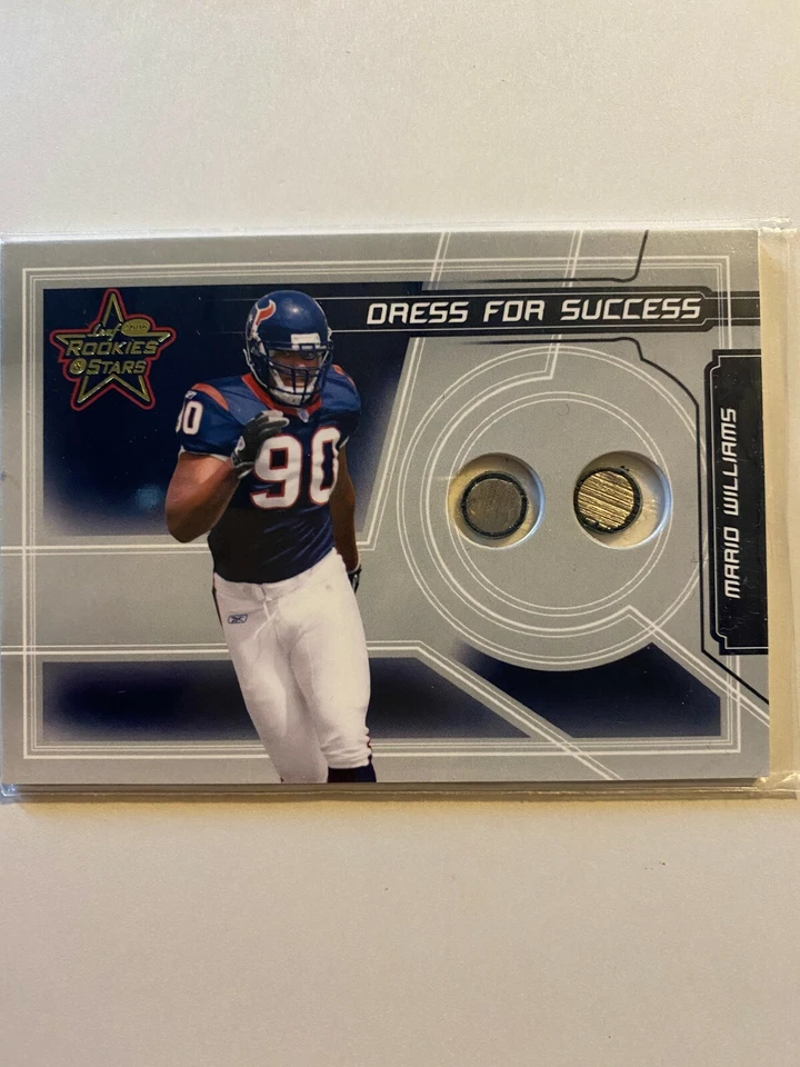 A9487 - 2006 Leaf Rookies & Stars Dress for Success Masks #14 Mario Williams/350 - Image 1 of 1