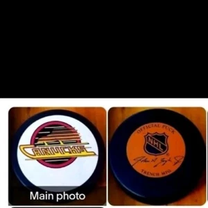 1985-92 VANCOUVER CANUCKS VINTAGE GENERAL TIRE SLUG ZIEGLER TRENCH MFG GAME PUCK - Picture 1 of 6