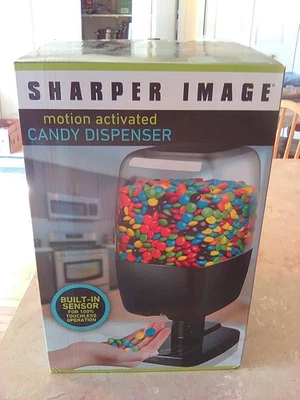 NEW Sharper Image Motion-Activated Candy Dispenser with Built-In Sensor - Image 1 of 4
