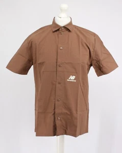 NEW BALANCE WOVEN SHIRT MENS TRUE BROWN SHORT SLEEVE NYLON RRP £85 AD - Picture 1 of 6
