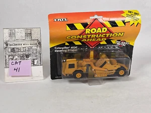 Ertl 2419 • Caterpillar • CAT 613C Elevating Scraper • Blister Pack - Picture 1 of 4