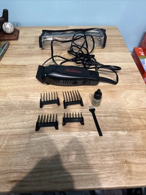 Cortapelos estilo peluquero Sunbeam tiene 4 guías de corte adicionales/cuchilla probada Foto 1 de 4