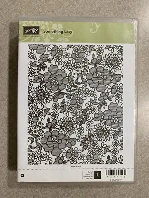 Estampación de algo de encaje bloque de madera sello flor fondo floral Foto 1 de 4