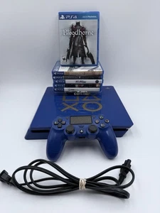 Sony PlayStation 4 Slim Blau Days of Play Edition Konsole mit 6 Spielen, Controller - Bild 1 von 11