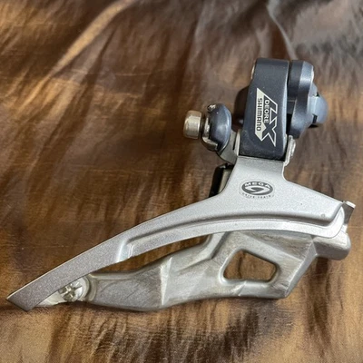 Câmbio dianteiro Shimano Deore LX FD-M571 34,9mm Mega 9 top MTB triplo 135g - Imagem 1 de 4