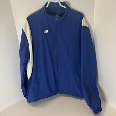 Chaqueta cortavientos New Balance para hombre azul y blanca talla L Foto 1 de 4