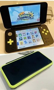 New Nintendo 2DS XL Nero + Giochi | Fully Customizable (+ Pokè Banca, aliment.) - Imagen 1 de 14