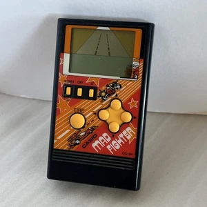 Vintage Casio CG-84 Mad Fighter Handheld LCD Game 1984 - Picture 1 of 4