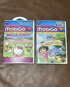 Vtech Mobigo Dora Explorer Twins Day Nickelodeon & Hello Kitty Both NEW SEALED - Picture 1 of 2
