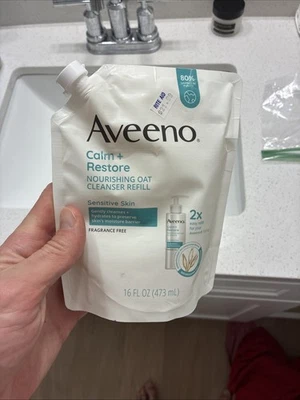 Limpiador nutritivo de avena Aveeno Calm + Restore 16 oz. Recarga Piel Sensible Foto 1 de 2