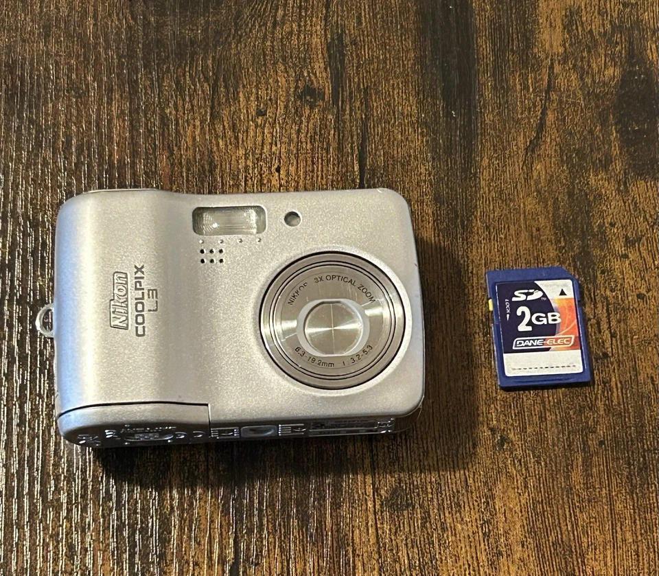 Nikon Coolpix L3 Digital Cameral Silver 5.1 MP 3X Zoom Tested Works 100% 2GB SD - Image 1 of 4