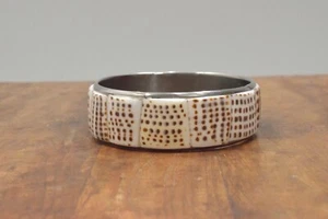 Brazalete concha de cono - Imagen 1 de 3