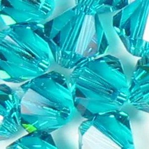SWAROVSKI CRYSTAL BEADS 4mm 5301 Bicone 100 BLUE ZIRCON - Picture 1 of 1