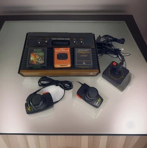 Atari 2600 4-Switch Woodgrain Console LOT w/ 3 Games, Joystick, Paddles & Coax - Picture 1 of 13