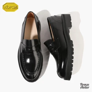 Mocasines de centavo Firenze Atelier negros de cuero de vaca punta dividida para hombre con suela vibram - Imagen 1 de 14