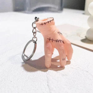 Simulación de mano para Wednesday Adams llaves de coche llavero accesorios TV regalo NUEVO - Imagen 1 de 16