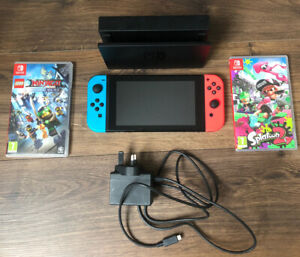 Nintendo Switch. Dock. Charger And Games. Comfort Grip